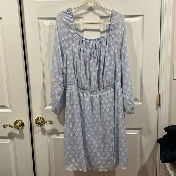 Long sleeve. Sheer sleeve. Dress with blow at front. - Picture 1 of 5